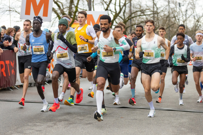 A group of people taking part in a race.